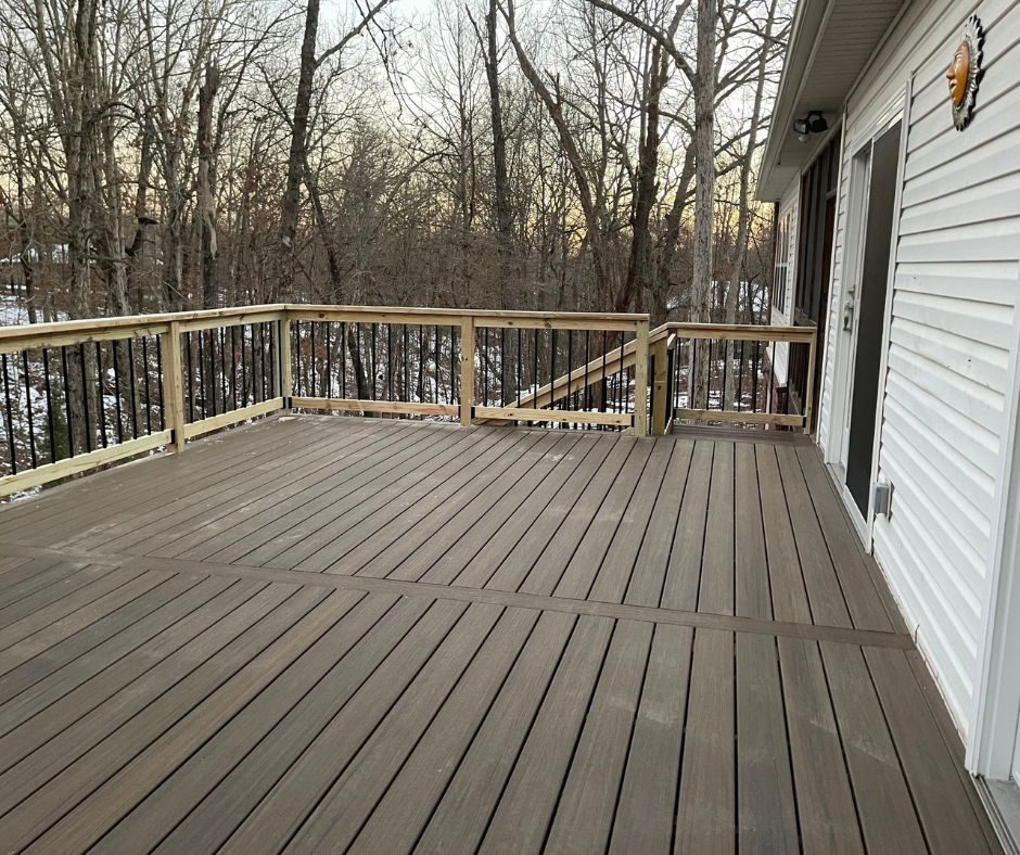 Gray composite deck with black metal railing, Northwest Arkansas