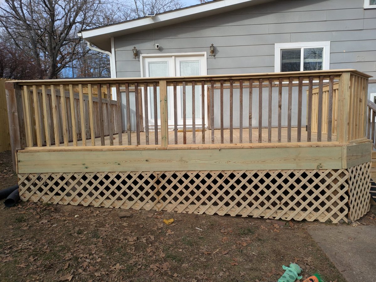 Wood deck with lattice skirting and wood baluster railing, Fayetteville Arkansas